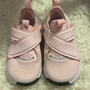 Toddler Nike Flyease sneakers.
